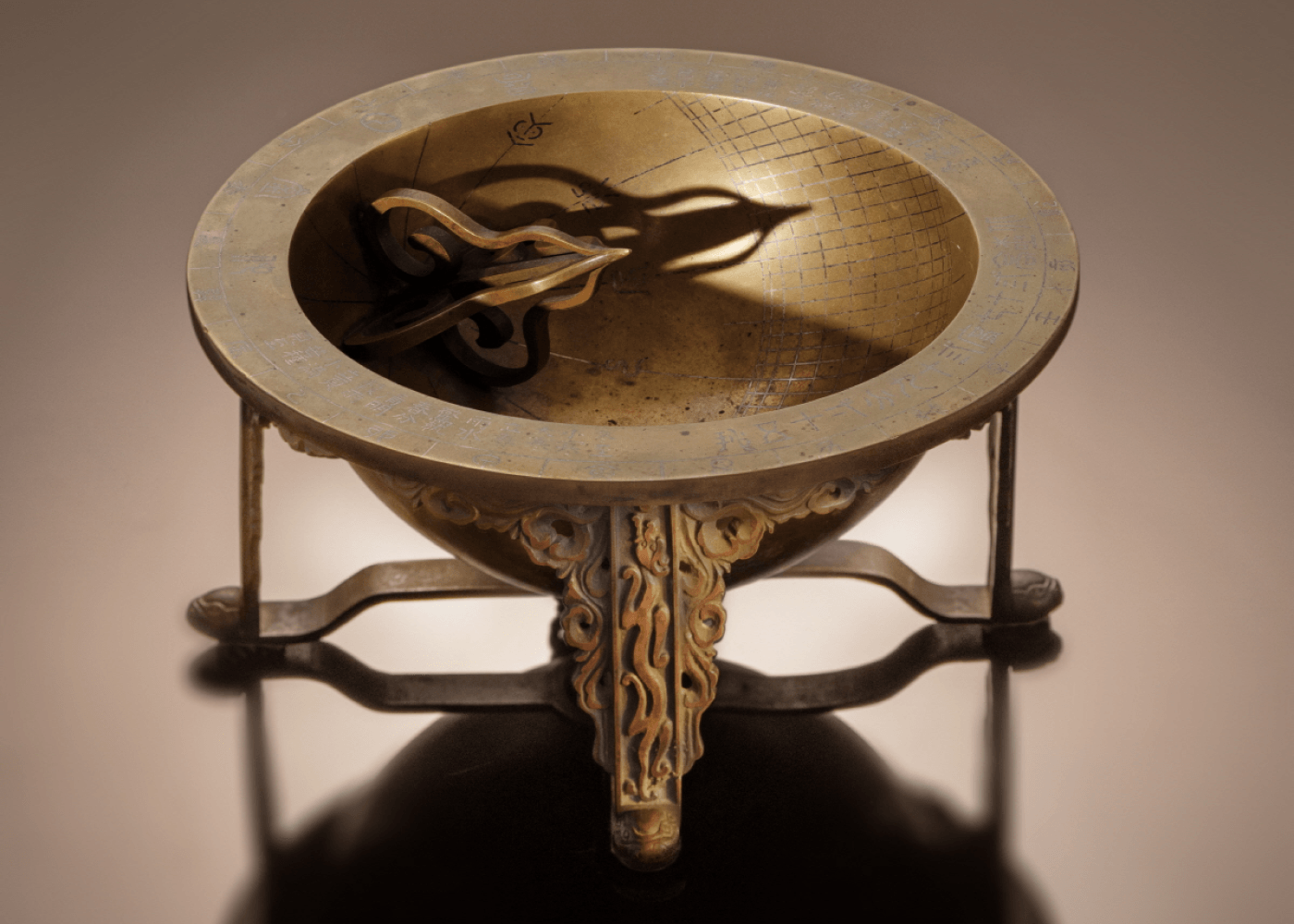 An example of the Angbu-ilgu hemispherical sundial. The sundials were cast in bronze and typically treated with a black coating with contrasting silver-inlaid markers and indexes. Above is an example with exposed bronze and silver-inlay which was purchased by the Korean government from a private American collection at auction. *Image source: Republic of Korea Cultural Heritage Administration.*